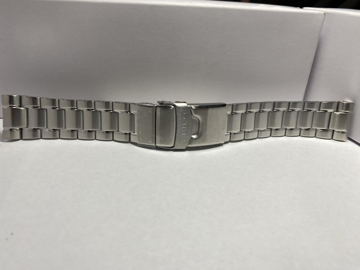 Seiko Original Watchband/Bracelet SRPE99.Solid Steel w/Logo Push Button Buckle.