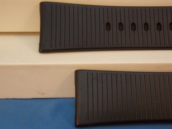 Casio Watchband MW-301 24mm Black Rubber Strap w/Gold Tone buckle.