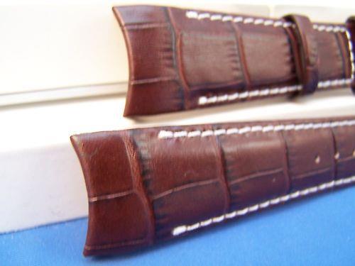 Citizen watchband AT0550-11X. ECO Drive 22mm Curved End Brown Leather .