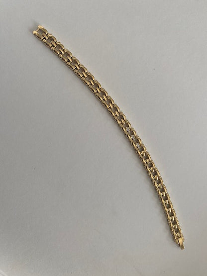 Ladies Bracelet Polished Gold Tone w/faux Diamond Inlay by Citizen.