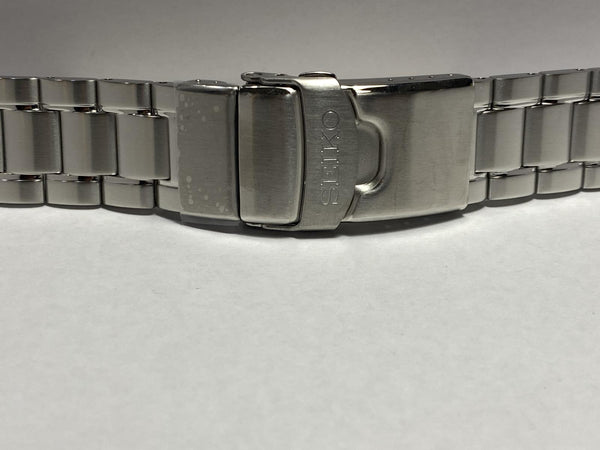 Seiko Original Watchband/Bracelet SRPE99.Solid Steel w/Logo Push Button Buckle.