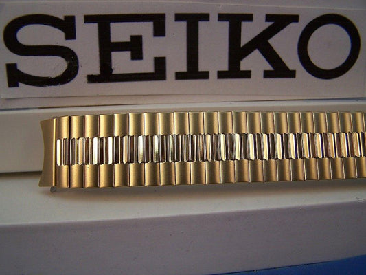 Seiko WatchBand Back Plate# 7N43-8A89 18mm gold tone Stretch Band w/Curved End