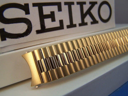 Seiko WatchBand Back Plate# 7N43-8A89 18mm gold tone Stretch Band w/Curved End