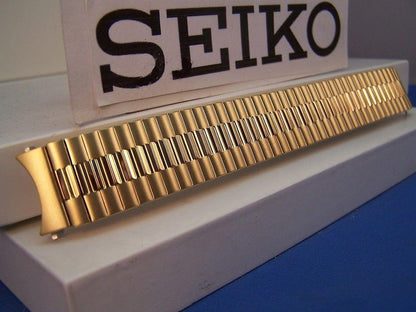 Seiko WatchBand Back Plate# 7N43-8A89 18mm gold tone Stretch Band w/Curved End