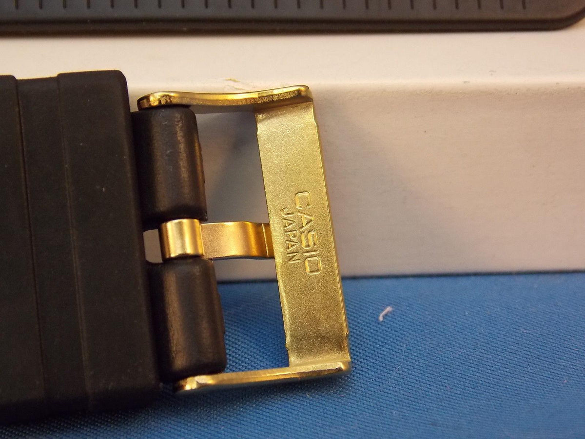 Casio Watchband MW-301 24mm Black Rubber Strap w/Gold Tone Buckle.