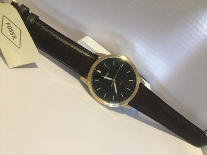 Fossil Mans Minimalist Dress Watch 44mm Case. Brown Band/Dial. Gold Tone Case.